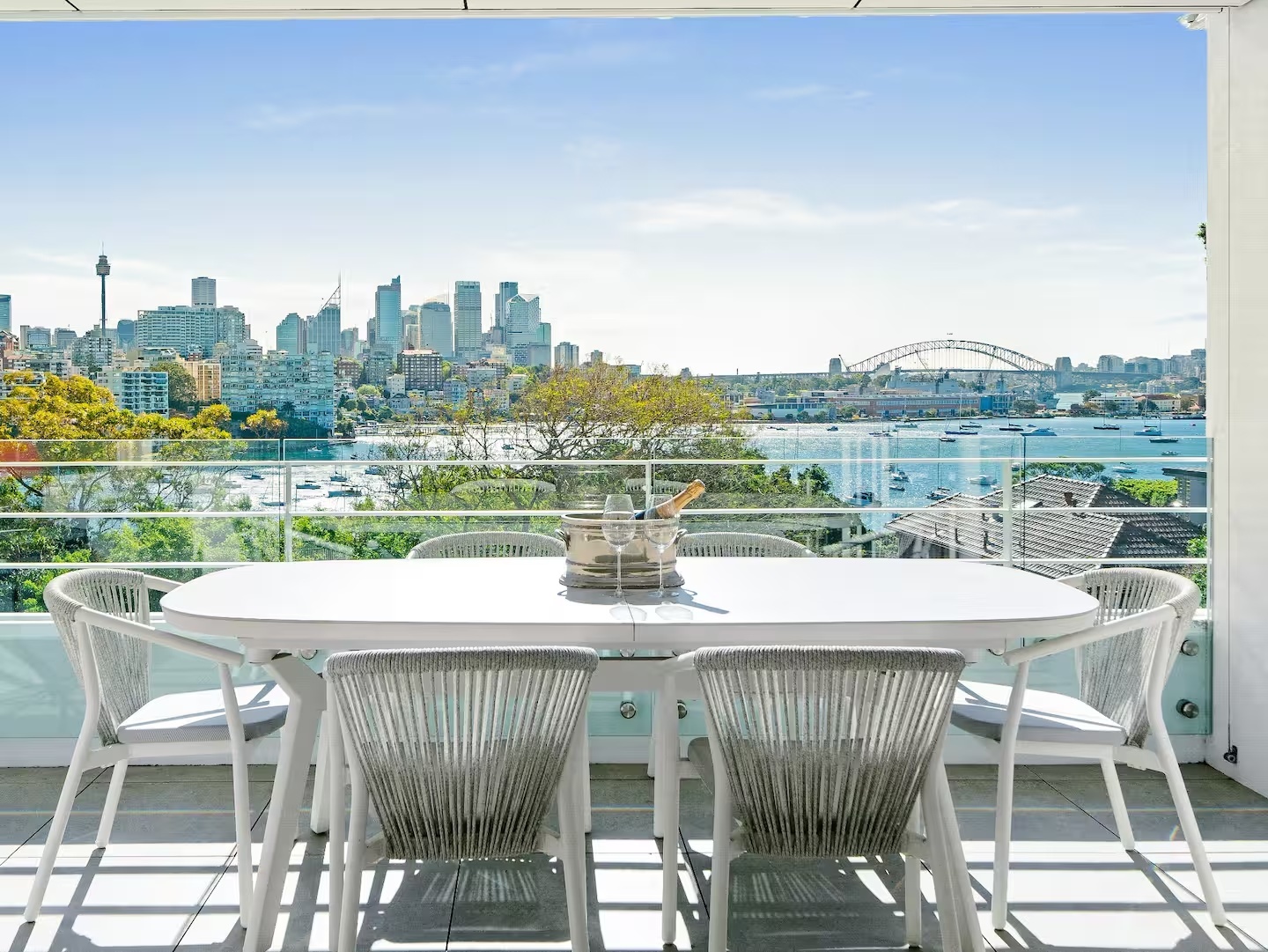 Sydney Harbour apartment balcony with Harbour Bridge and Opera House views